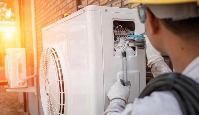Ductless HVAC installation for a Toronto home exterior.