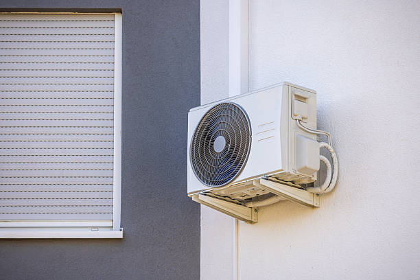 Go Ductless Inc. | Heat Pump Not Heating or Cooling? Troubleshooting Guide Before Booking Repairs Outdoor heat pump unit installed on an exterior wall